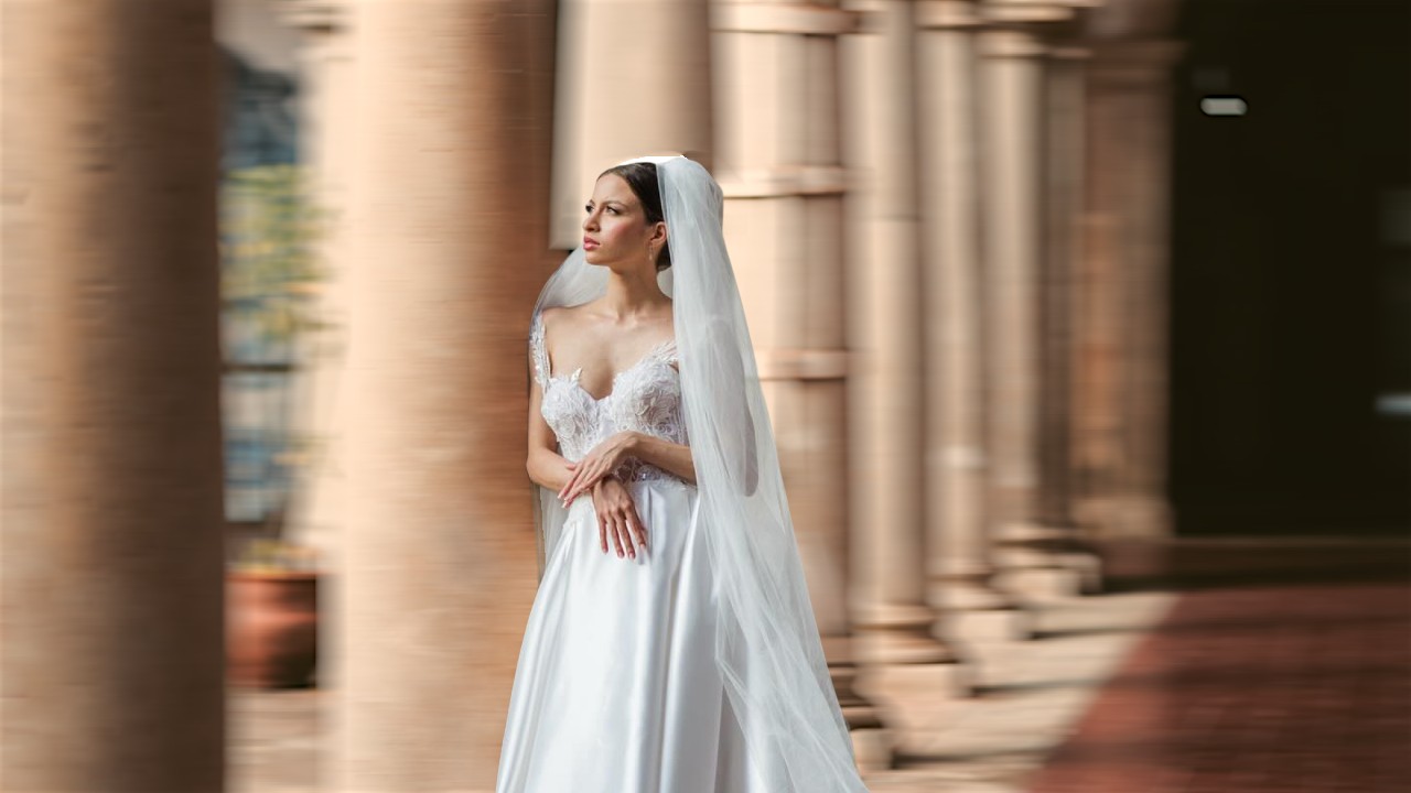 Noiva em vestido escultural de alta costura